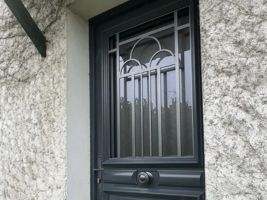 Porte d’entrée Bel’m Cambon en bois – réalisation Bournigal à Nantes